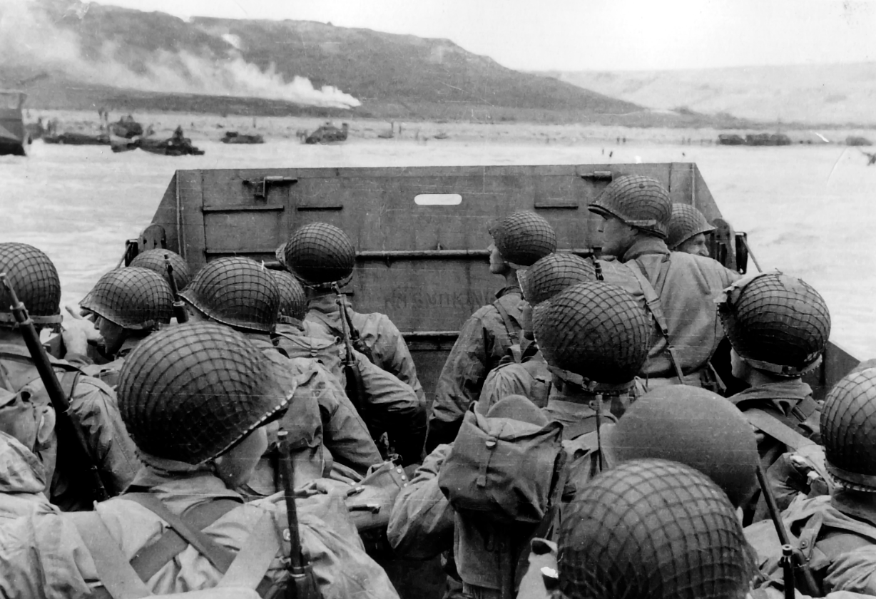 Vintage photgraph of World War 2 soldiers crowded on a landing craft